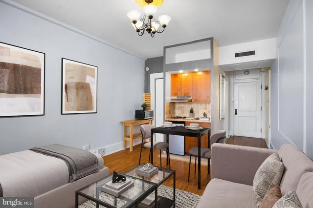 a living room with furniture and a window
