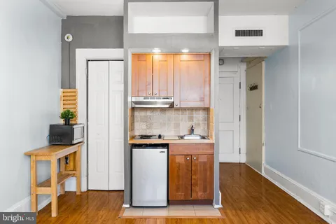 a view of a kitchen with a sink