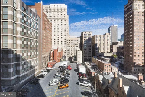 a city street filled with lots of tall buildings
