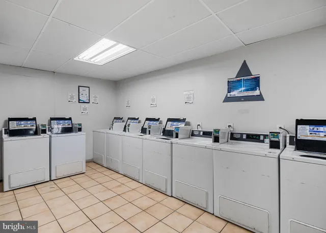 a kitchen with sink cabinets and window
