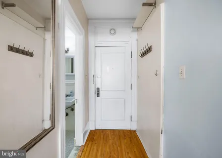 a bathroom with a tub and shower