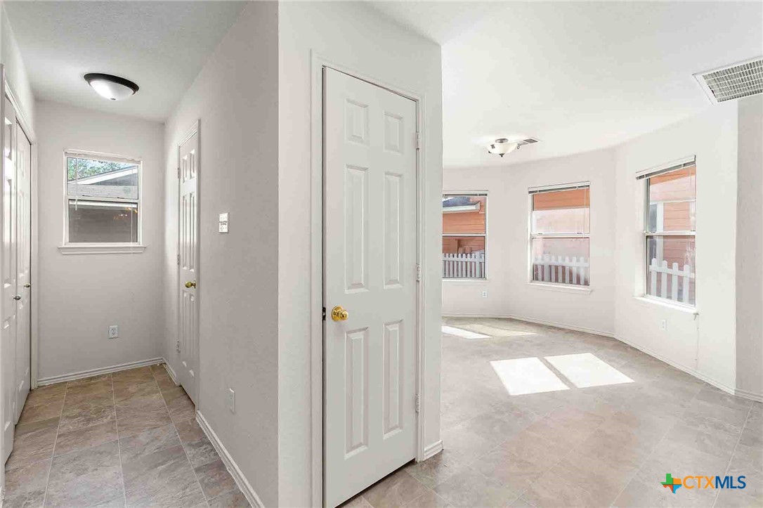 280 Strawn Kyle, TX 78640 - Photo 9 of 27 Pantry, Half Bath and Laundry Area
