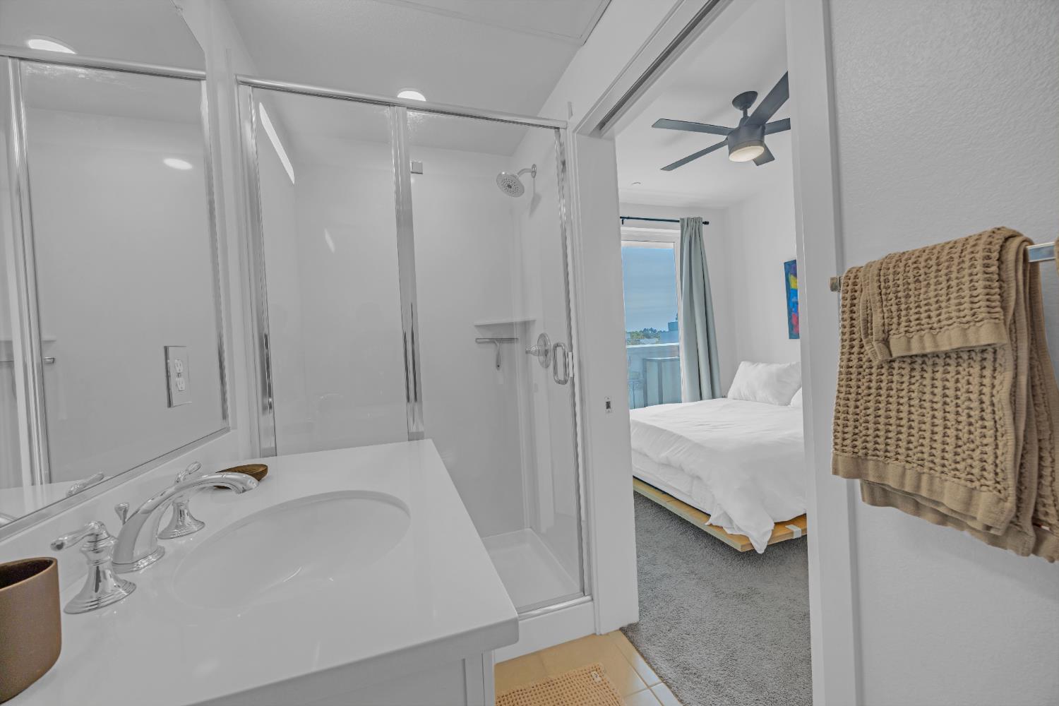 2431 Cleat Lane, Unit 301 Sacramento, CA 95818 - Photo 18 of 18 a bathroom with a sink and mirror