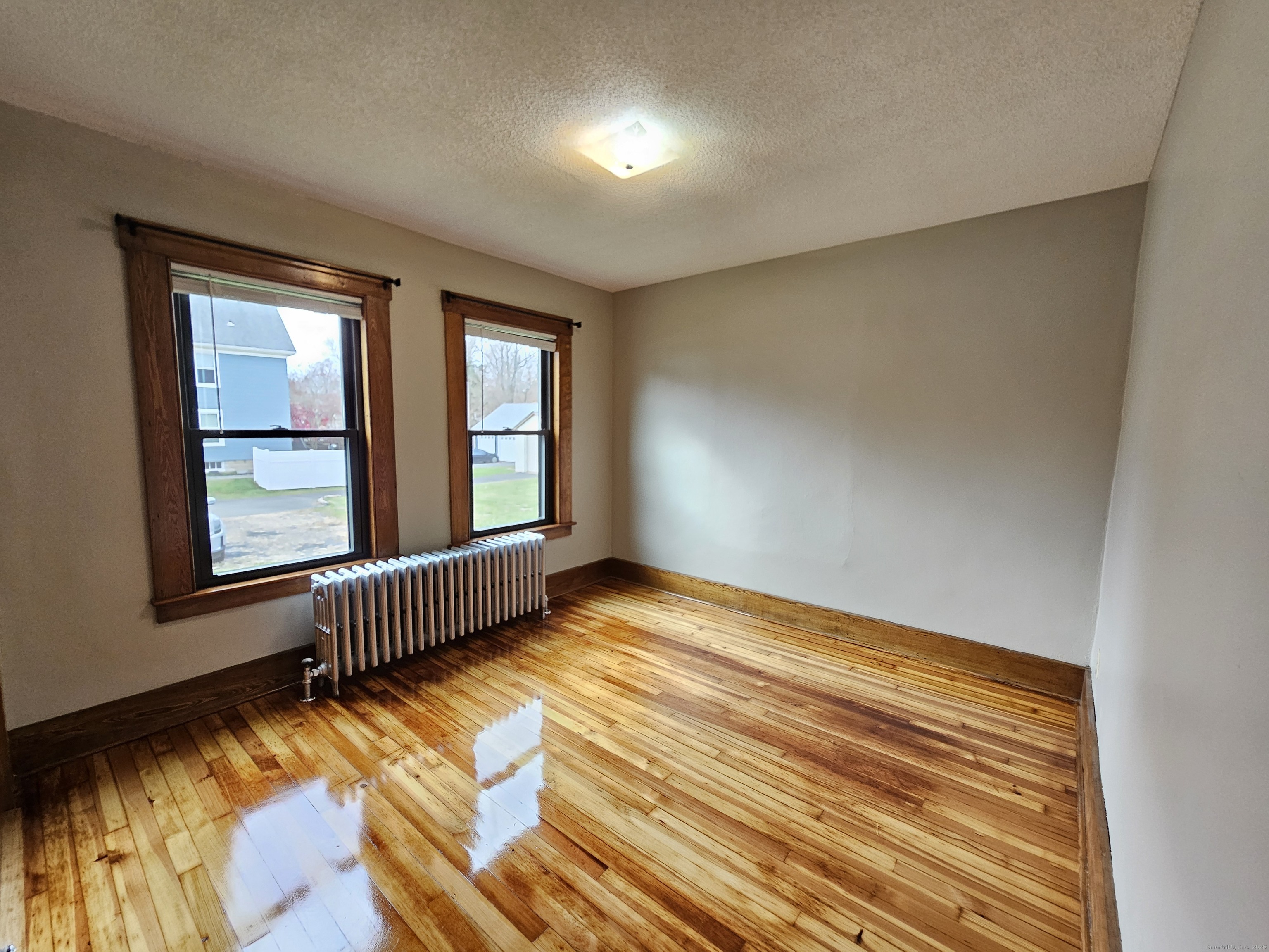 581 Center Street, Unit 1 Wallingford, CT 06492 - Photo 12 of 14 a view of an empty room and window