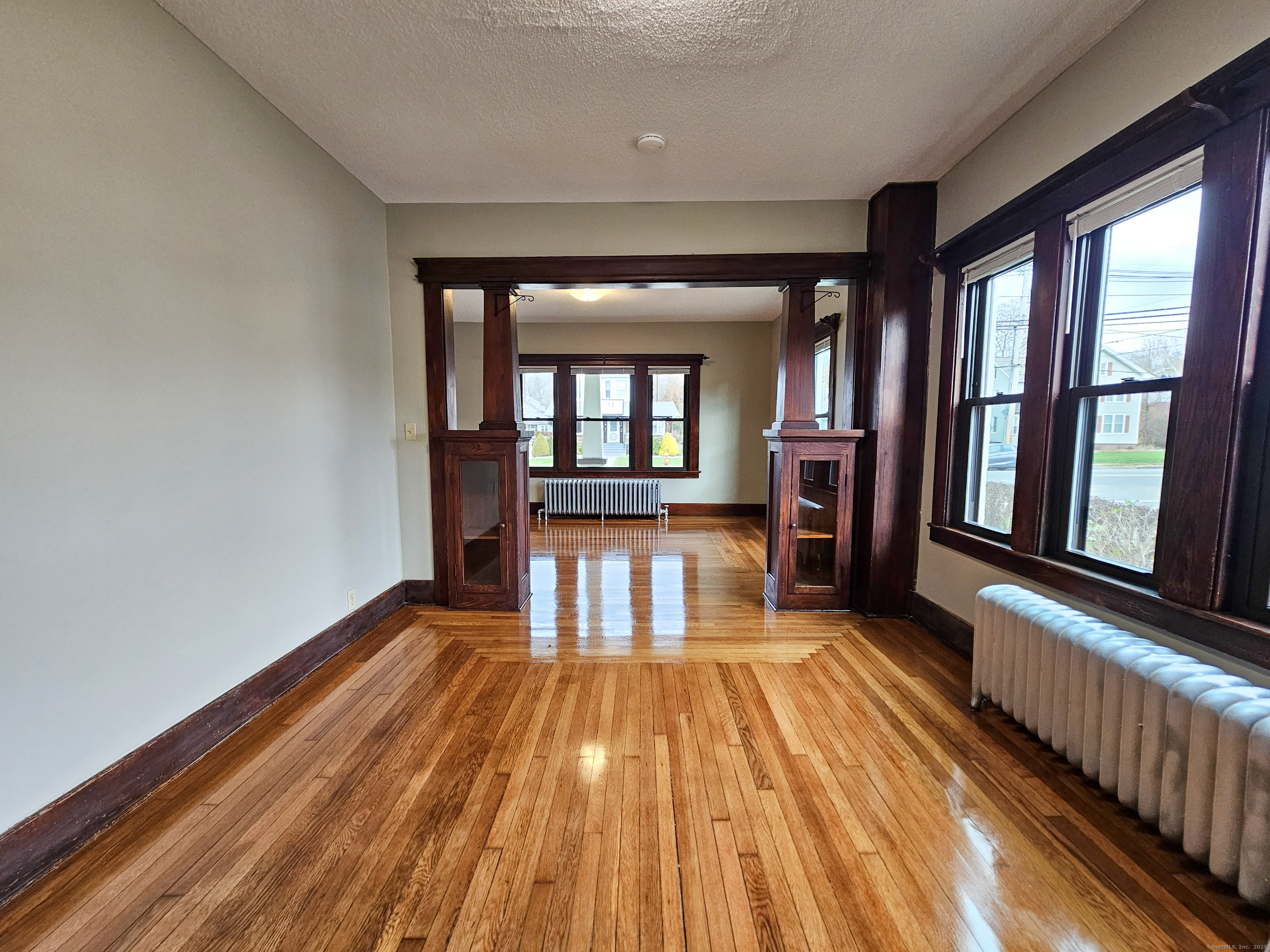 581 Center Street, Unit 1 Wallingford, CT 06492 - Photo 6 of 14 wooden floor in a hall with an entryway