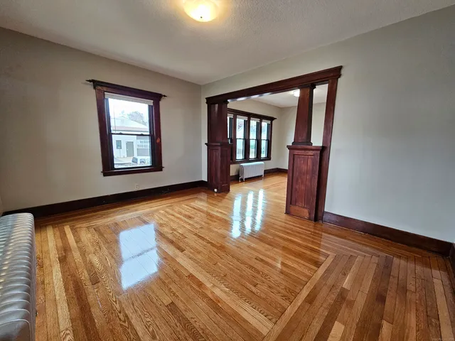 a view of an empty room and window
