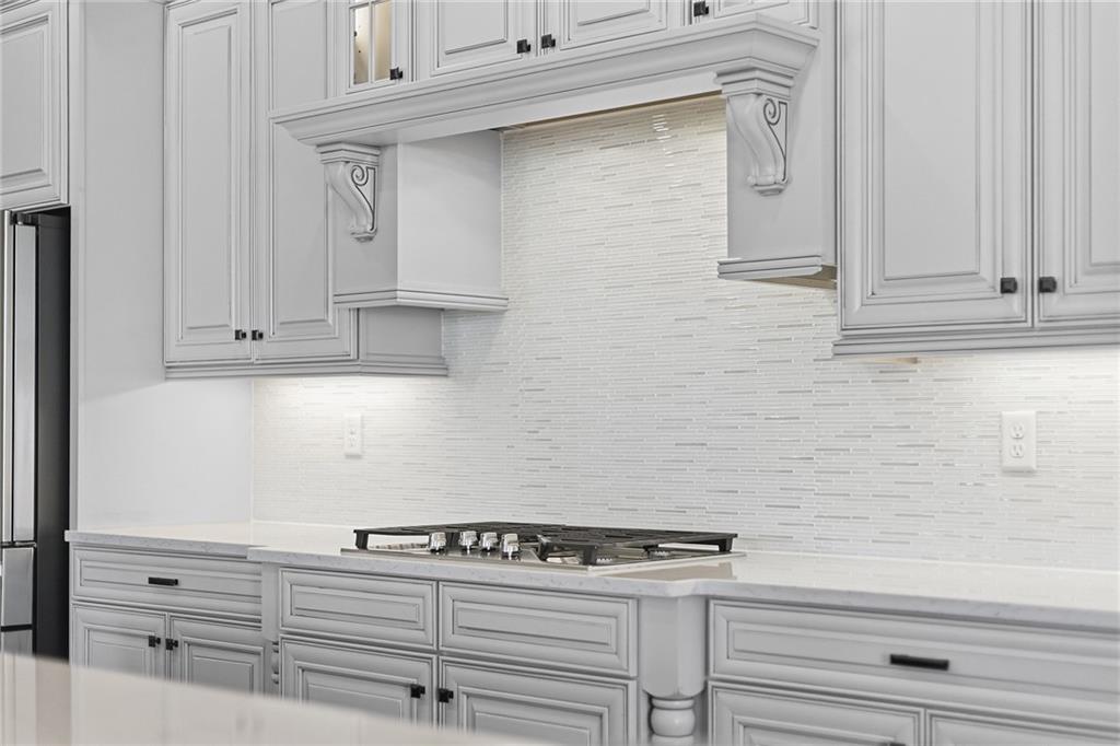 2015 Cherry Road Gibsonia, PA 15044 - Photo 13 of 50 a stove top oven sitting inside of a kitchen