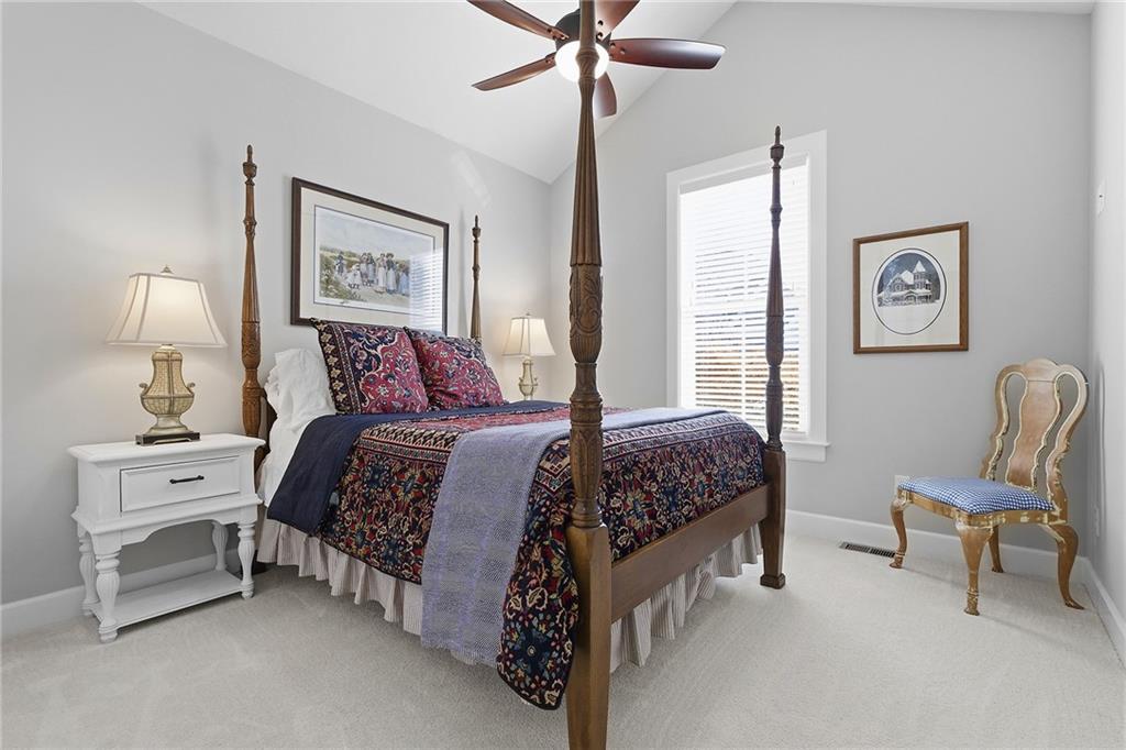 2015 Cherry Road Gibsonia, PA 15044 - Photo 24 of 50 a bedroom with a bed and a chandelier