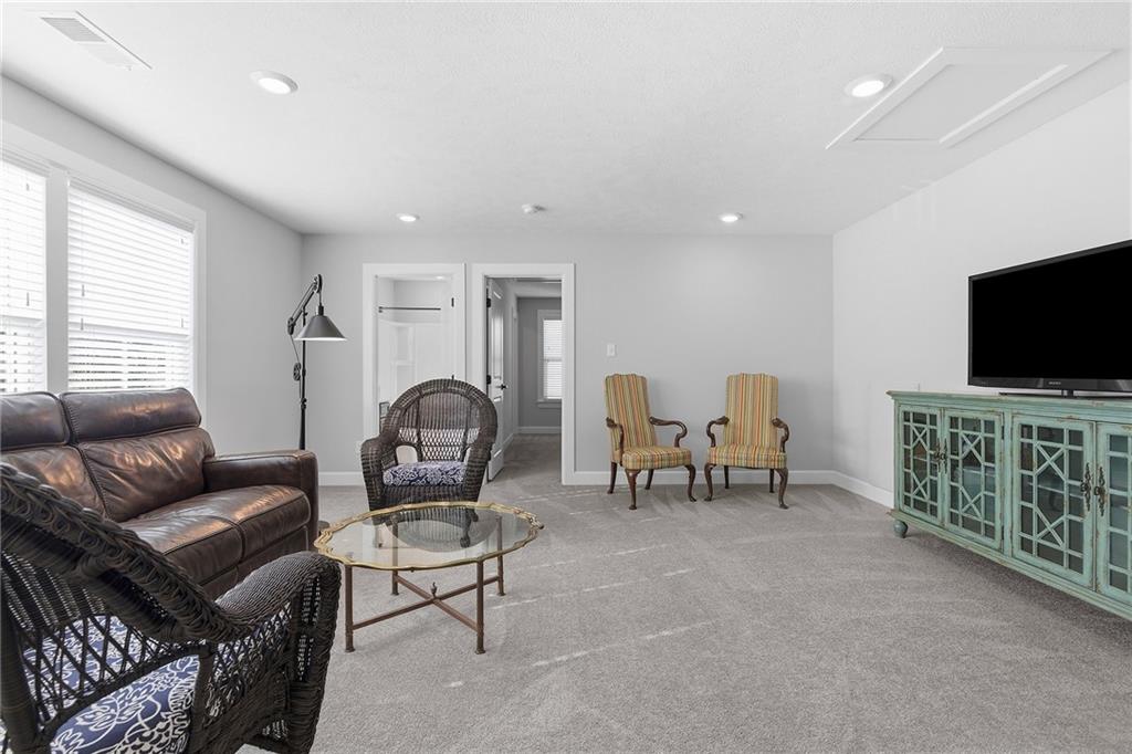 2015 Cherry Road Gibsonia, PA 15044 - Photo 31 of 50 a living room with furniture and a flat screen tv