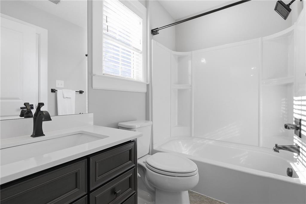 2015 Cherry Road Gibsonia, PA 15044 - Photo 33 of 50 a bathroom with a sink a toilet and shower