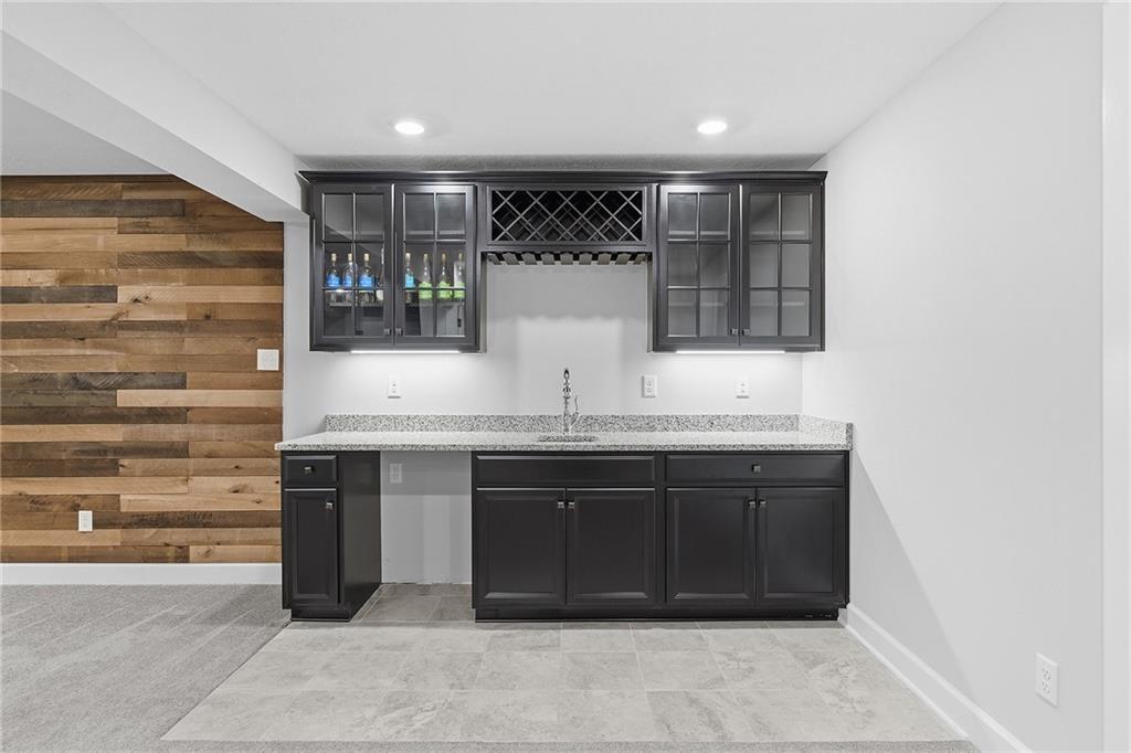 2015 Cherry Road Gibsonia, PA 15044 - Photo 37 of 50 a bathroom with a granite countertop sink and a bathtub