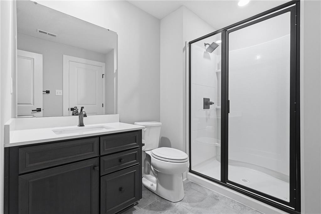 2015 Cherry Road Gibsonia, PA 15044 - Photo 42 of 50 a bathroom with a double vanity sink toilet and shower