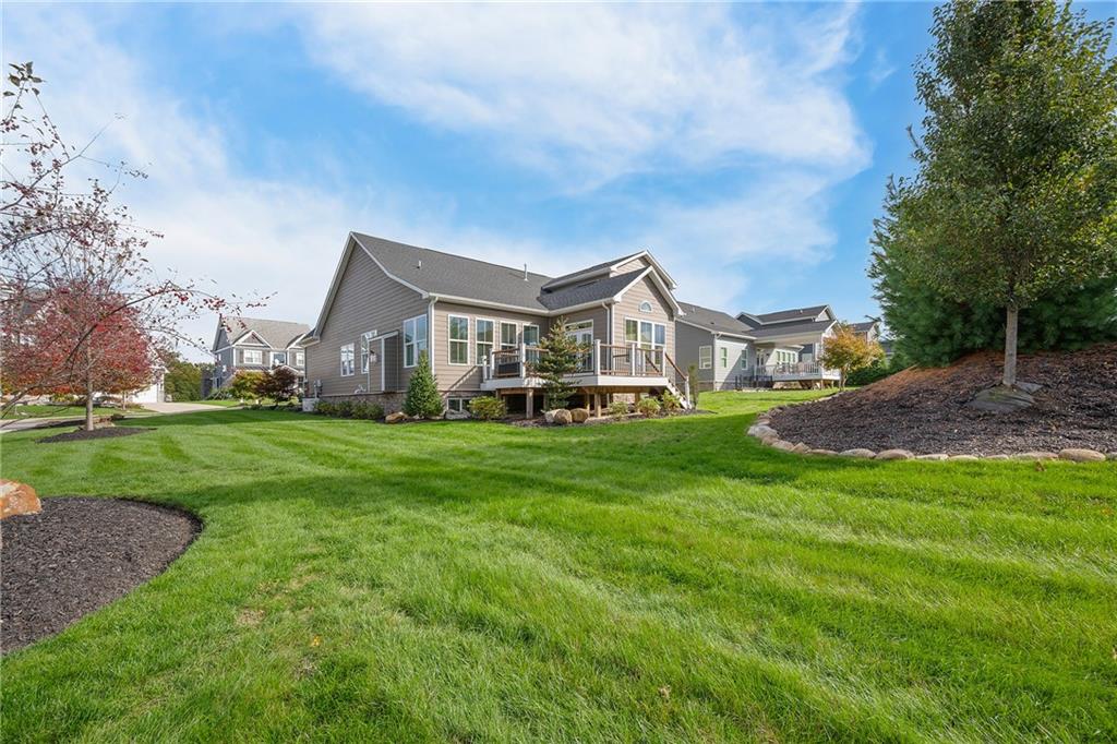2015 Cherry Road Gibsonia, PA 15044 - Photo 48 of 50 a view of a house with a big yard and large trees