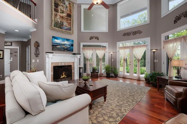 a kitchen with stainless steel appliances granite countertop a sink stove and microwave