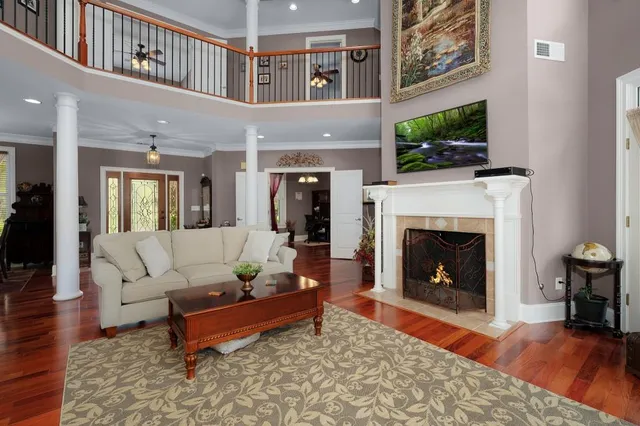 a kitchen with stainless steel appliances granite countertop a refrigerator stove and a sink