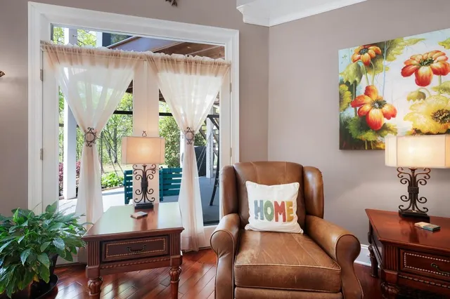 a view of a dining room with furniture window and outside view