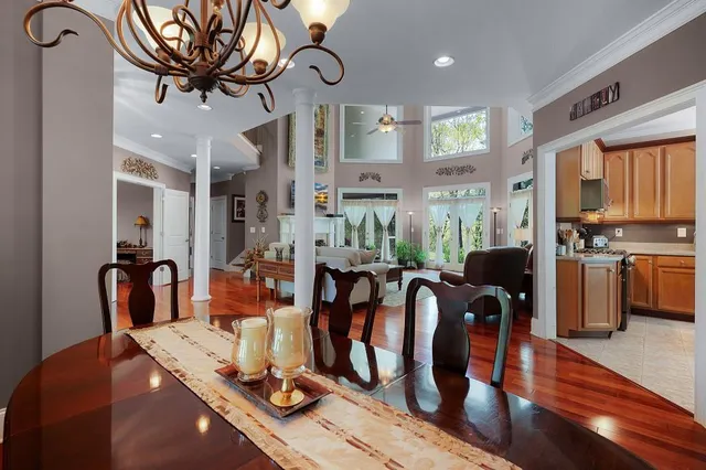 a bathroom with a toilet a sink and a mirror