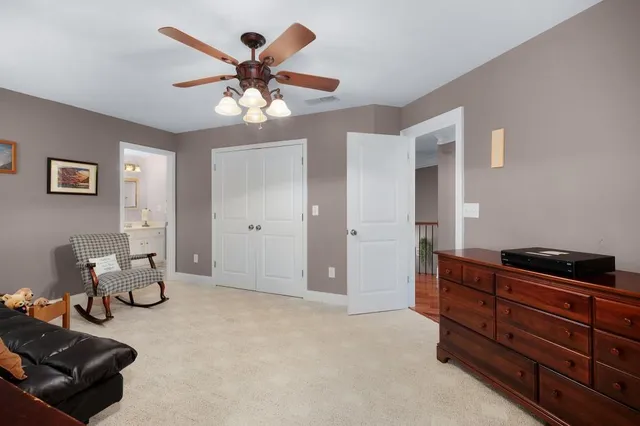 a view of a swimming pool with a lounge chair