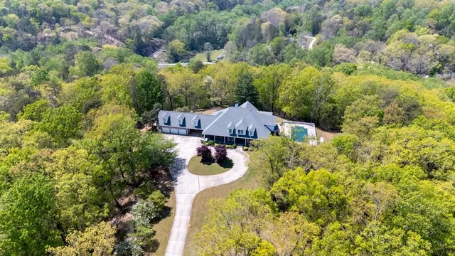 a front view of house with yard and seating space