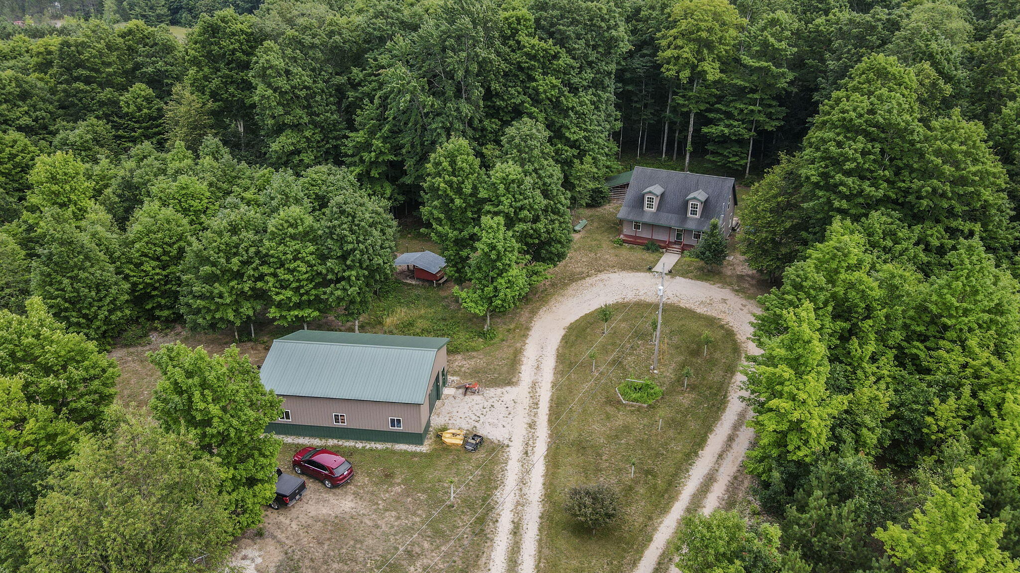 11711 Cinder Road Beulah, MI 49617 - Photo 2 of 53 56-web-or-mls-DJI_0449