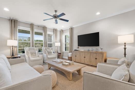 48 Barefoot Cove Freeport, FL 32439 - Photo 28 of 82 a living room with furniture and a flat screen tv