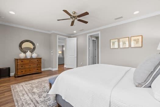 48 Barefoot Cove Freeport, FL 32439 - Photo 32 of 82 a bedroom with a bed and a dresser