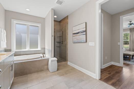 48 Barefoot Cove Freeport, FL 32439 - Photo 36 of 82 a bathroom with a tub shower and sink