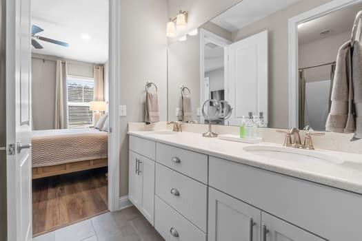 48 Barefoot Cove Freeport, FL 32439 - Photo 39 of 82 a en suite bathroom with double sink and a large mirror