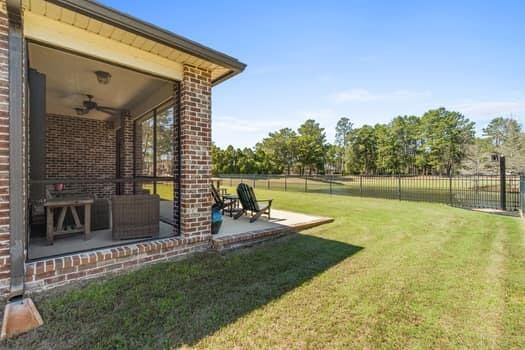 48 Barefoot Cove Freeport, FL 32439 - Photo 50 of 82 a view of a house with a yard