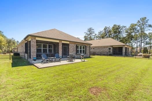 48 Barefoot Cove Freeport, FL 32439 - Photo 51 of 82 a view of a house with swimming pool and porch with furniture