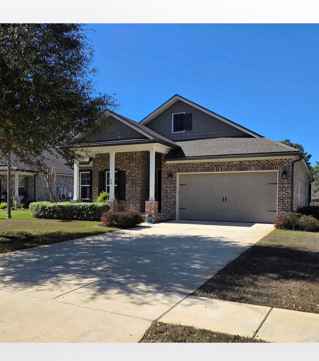 48 Barefoot Cove Freeport, FL 32439 - Photo 58 of 82 a front view of a house with a yard
