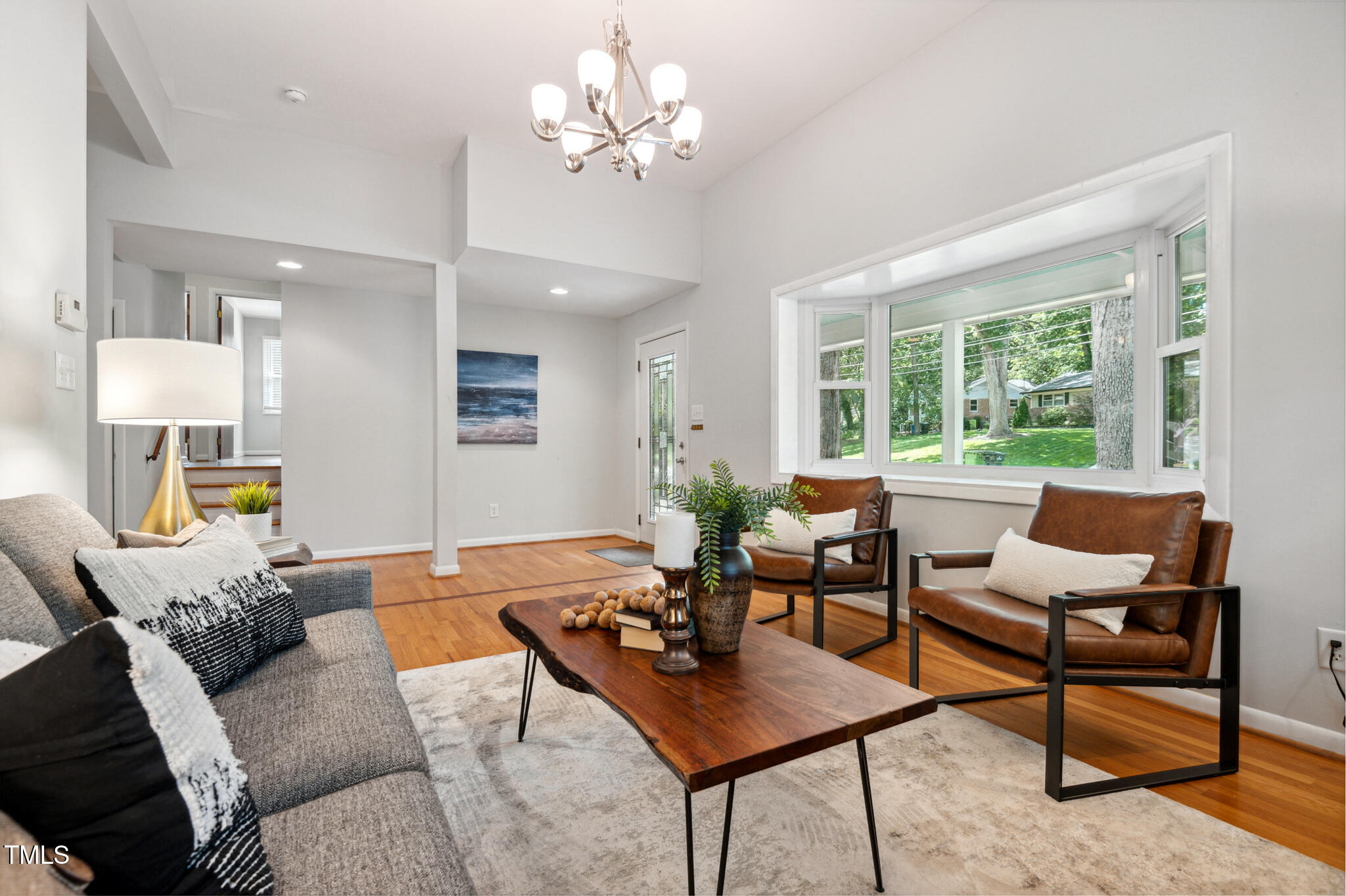 205 Northfield Drive Raleigh, NC 27609 - Photo 17 of 87 a living room with furniture and a large window