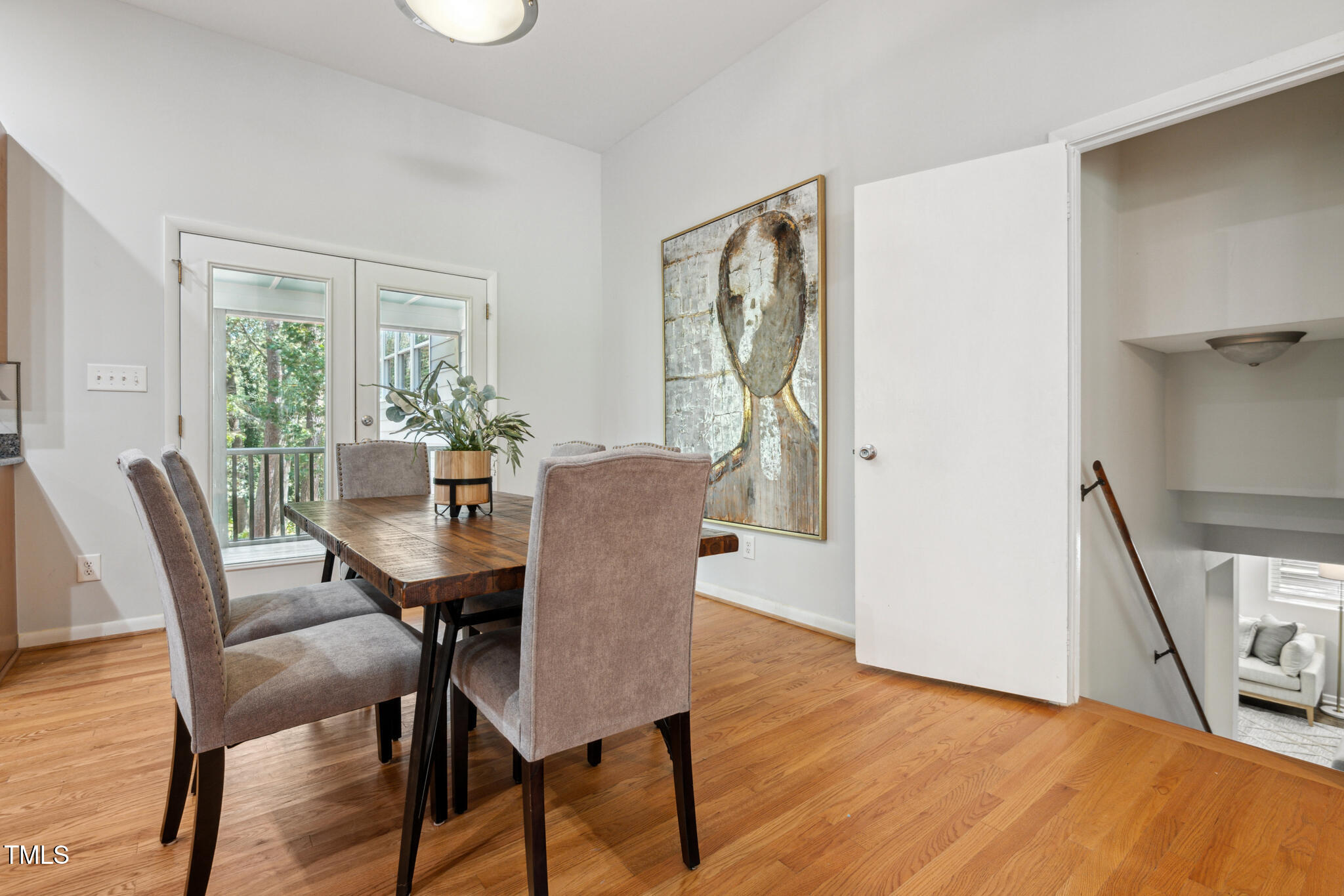 205 Northfield Drive Raleigh, NC 27609 - Photo 18 of 87 a view of a dining room with furniture window and wooden floor