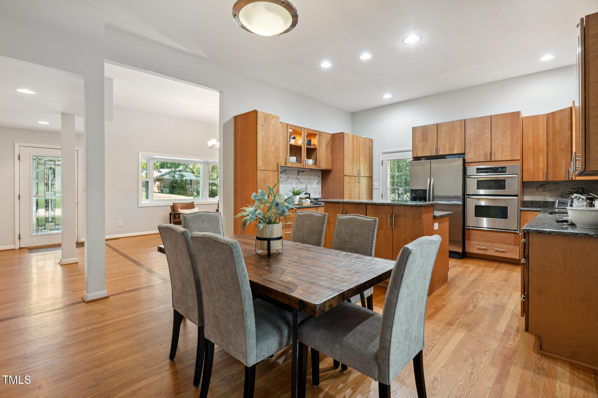 205 Northfield Drive Raleigh, NC 27609 - Photo 20 of 87 a view of a dining room with furniture window and wooden floor