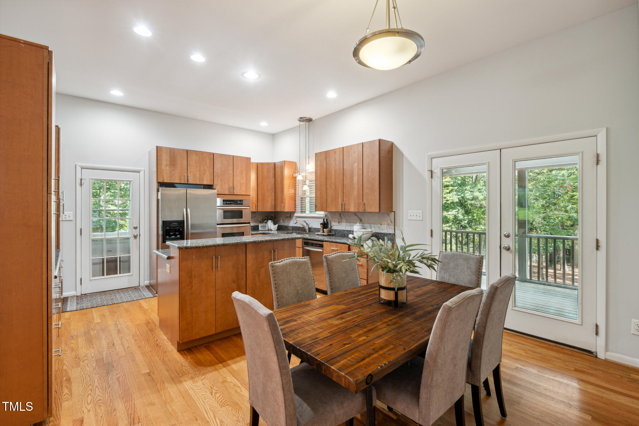 205 Northfield Drive Raleigh, NC 27609 - Photo 21 of 87 a view of a dining room with furniture window and wooden floor