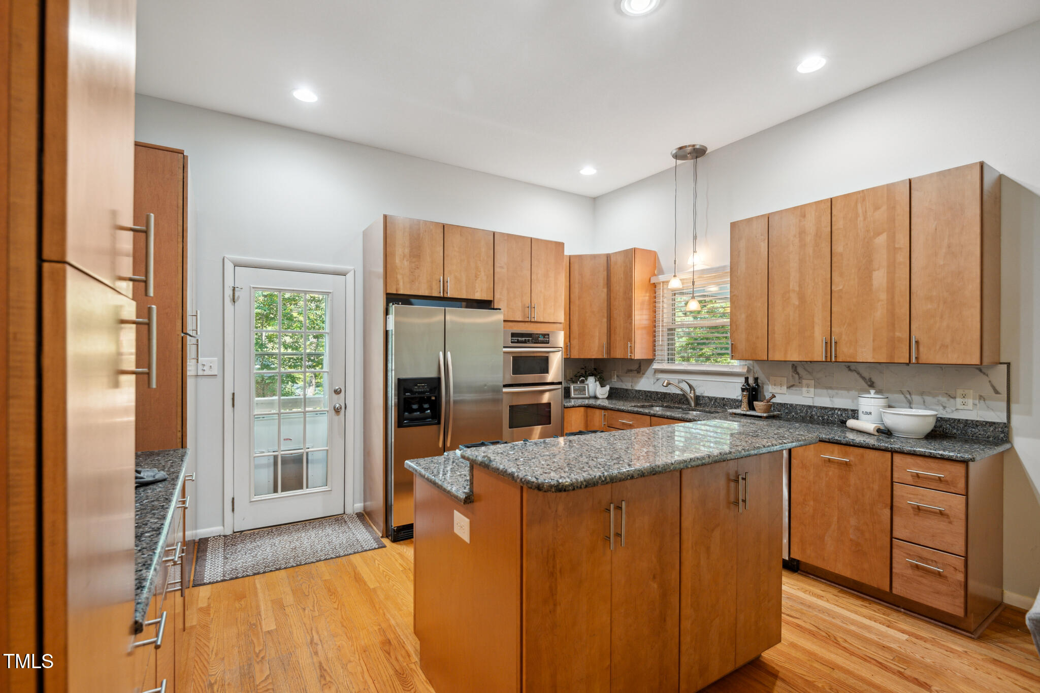 205 Northfield Drive Raleigh, NC 27609 - Photo 24 of 87 a kitchen with a sink stove and refrigerator