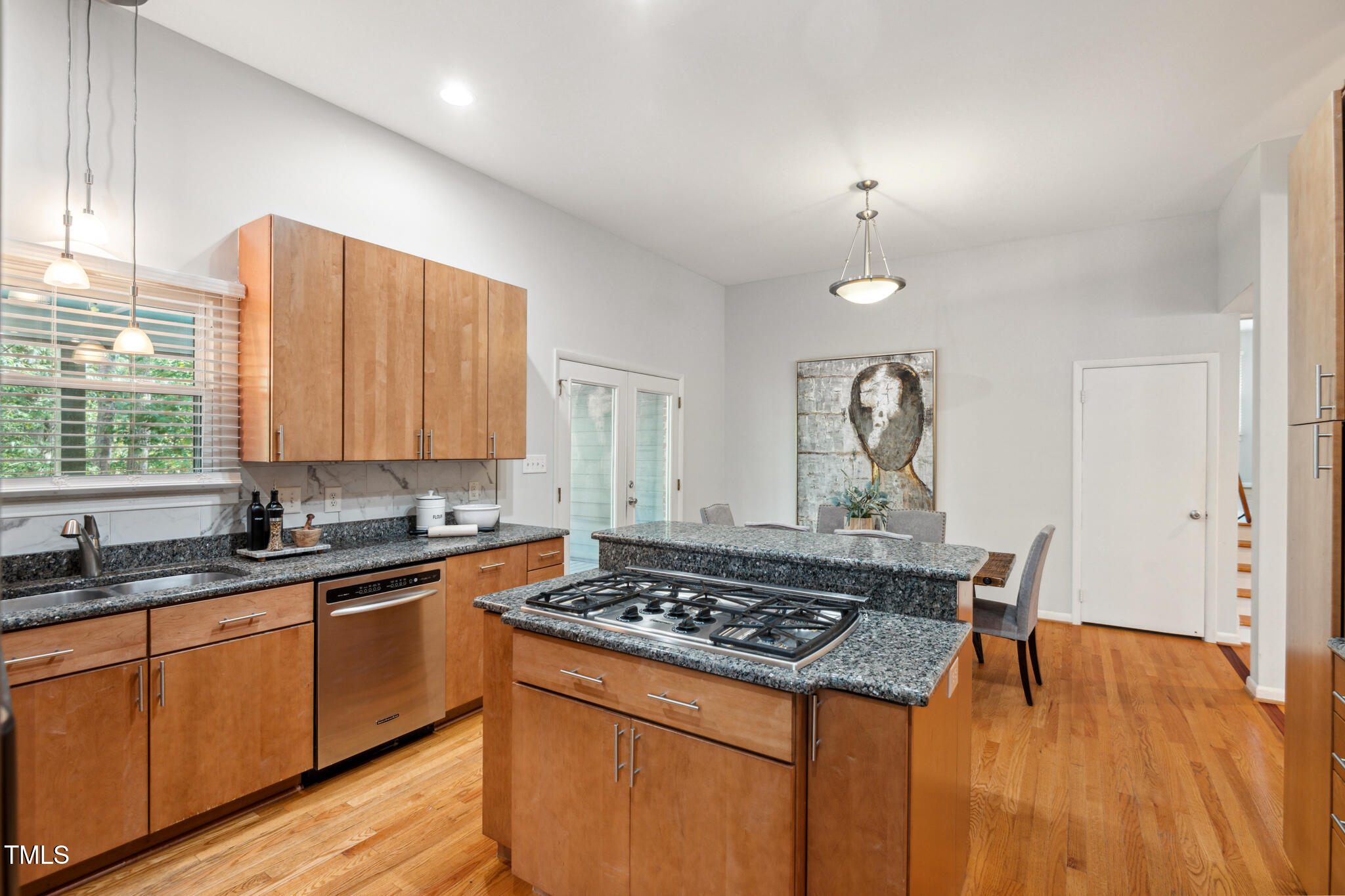 205 Northfield Drive Raleigh, NC 27609 - Photo 26 of 87 a kitchen with a sink a stove and cabinets