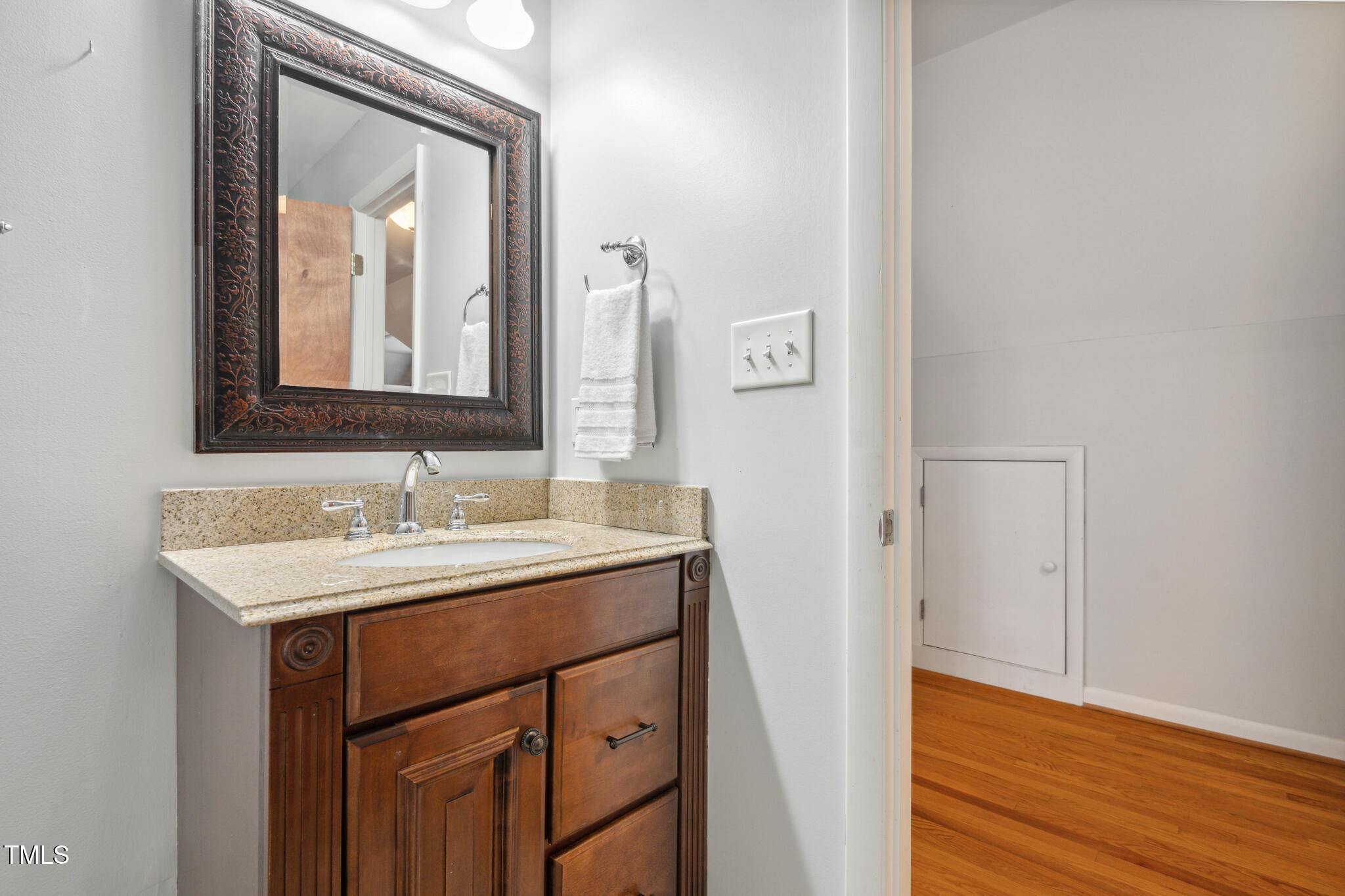 205 Northfield Drive Raleigh, NC 27609 - Photo 55 of 87 a bathroom with a sink and a mirror