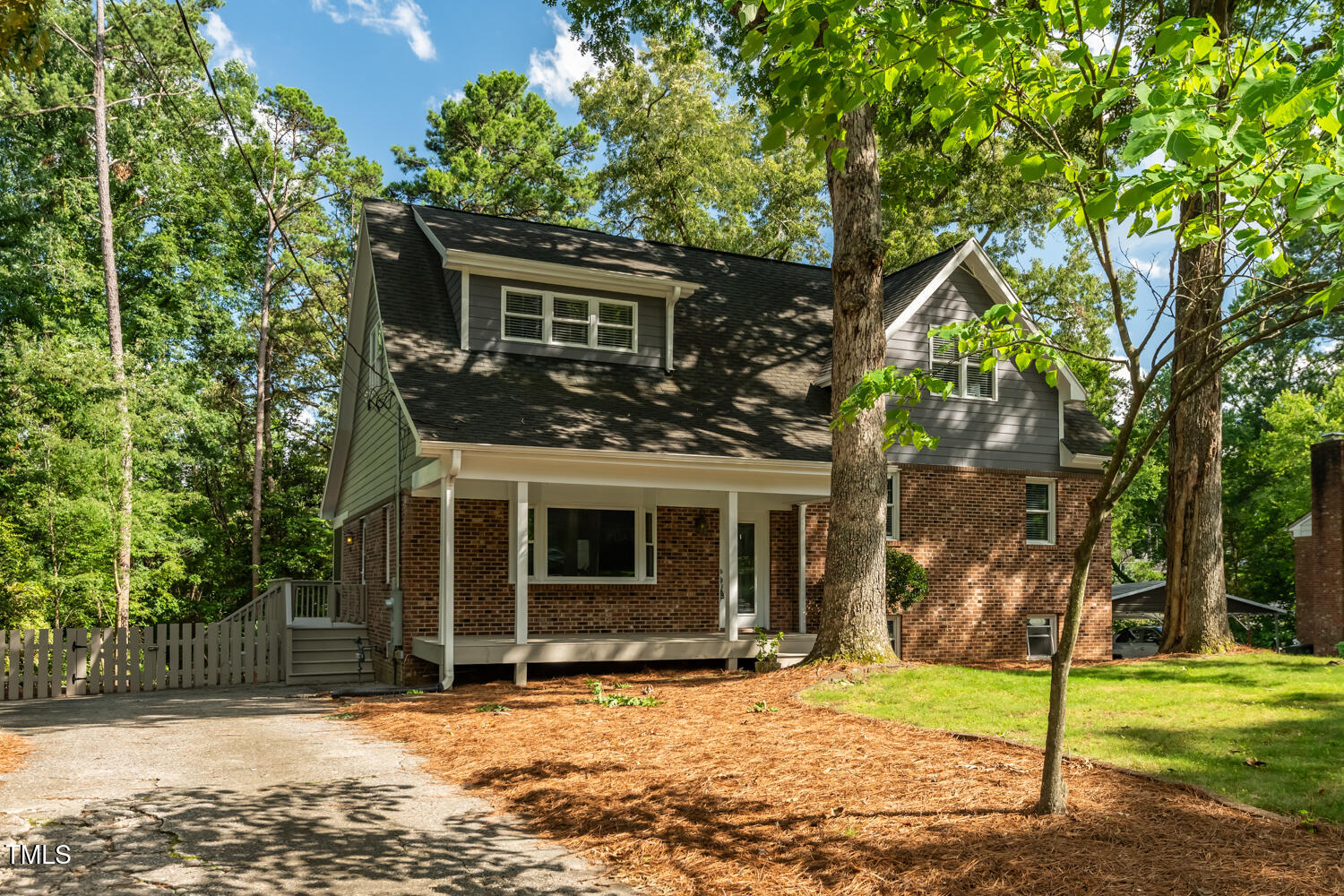205 Northfield Drive Raleigh, NC 27609 - Photo 6 of 87 a front view of a house with a yard