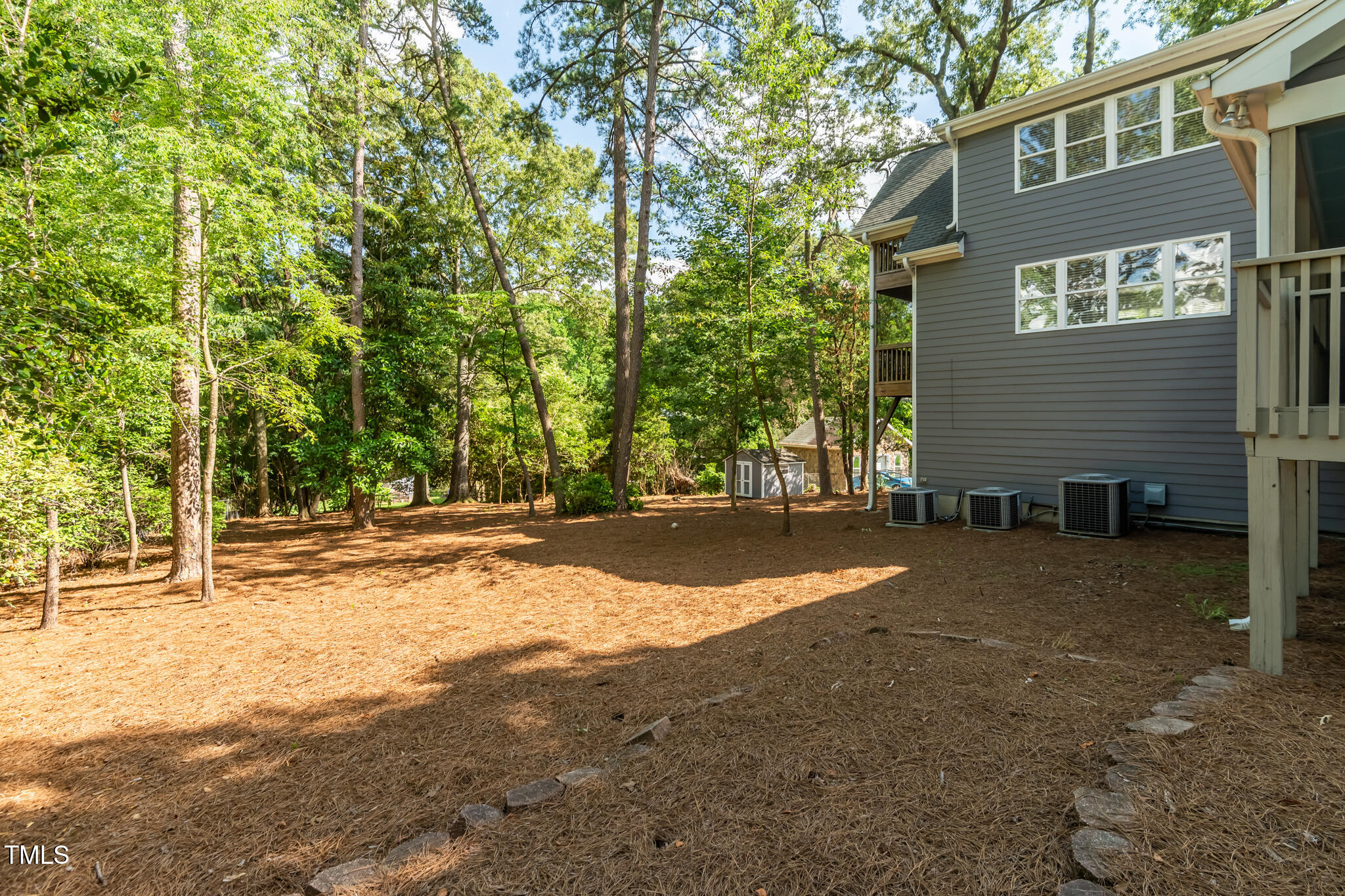 205 Northfield Drive Raleigh, NC 27609 - Photo 78 of 87 a view of backyard of house with green space