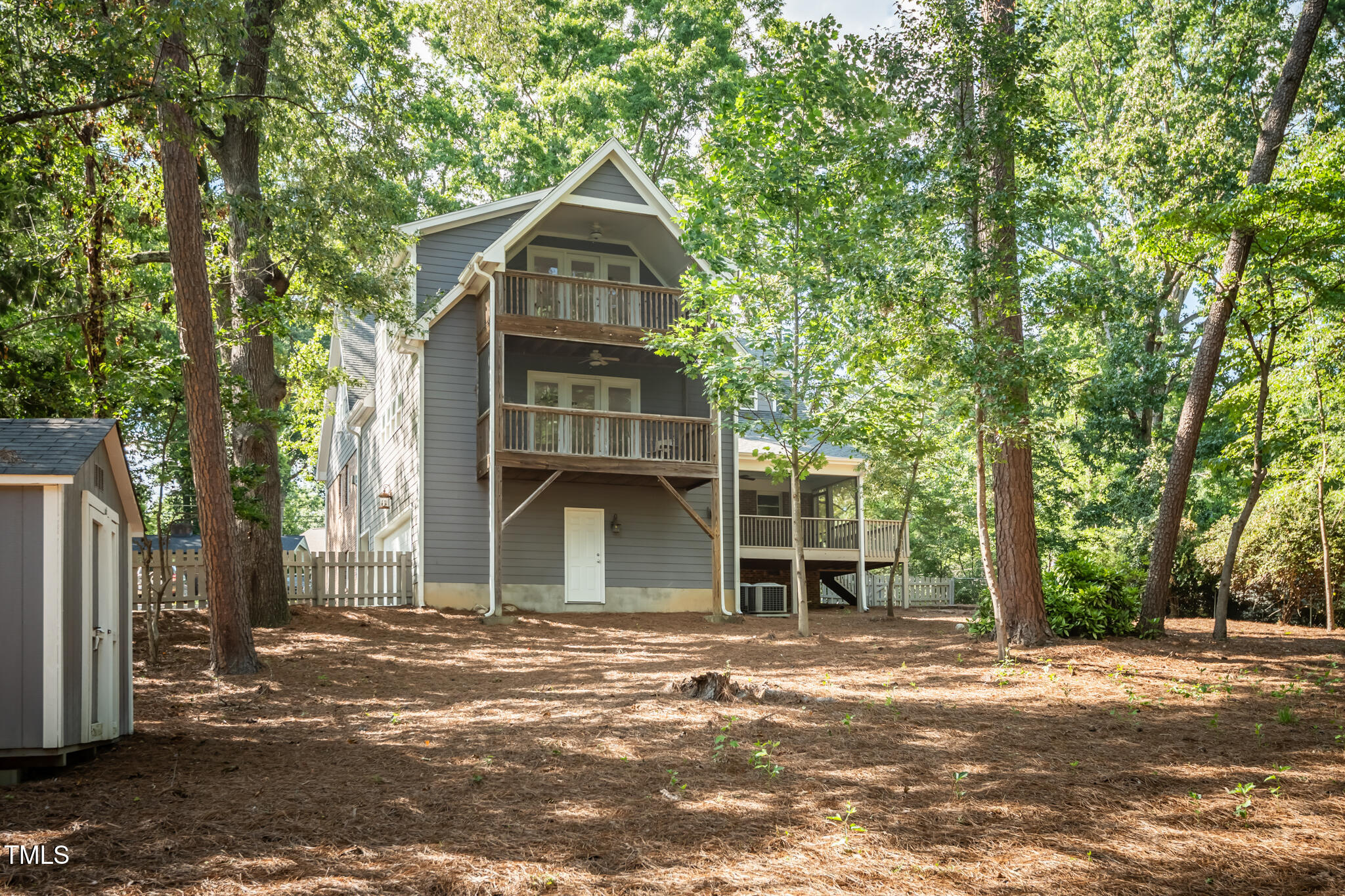 205 Northfield Drive Raleigh, NC 27609 - Photo 80 of 87 a front view of a house with a garden