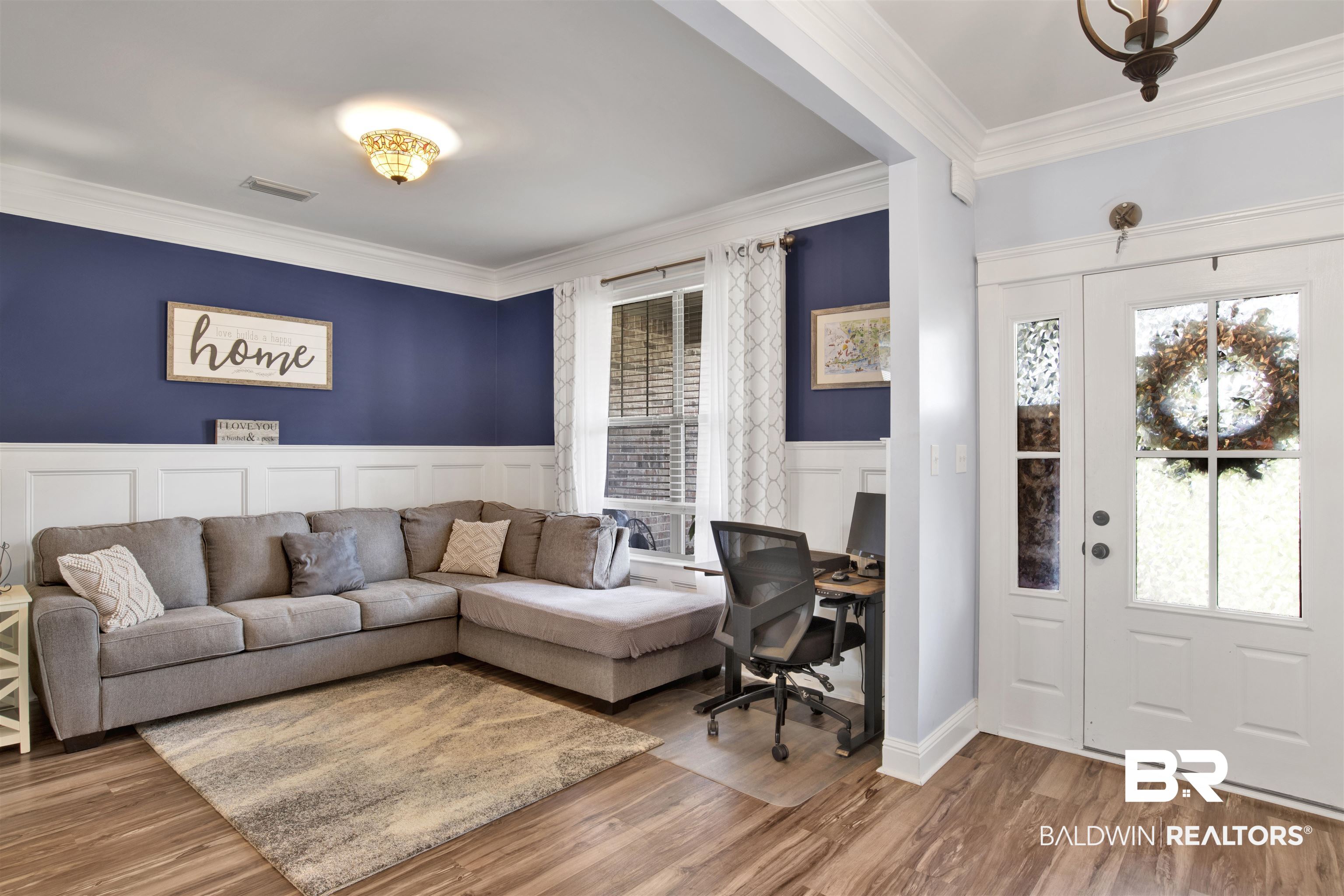 12418 Cambron Trail Daphne, AL 36527 - Photo 14 of 44 Living room featuring crown molding and hardwood / wood-style floors