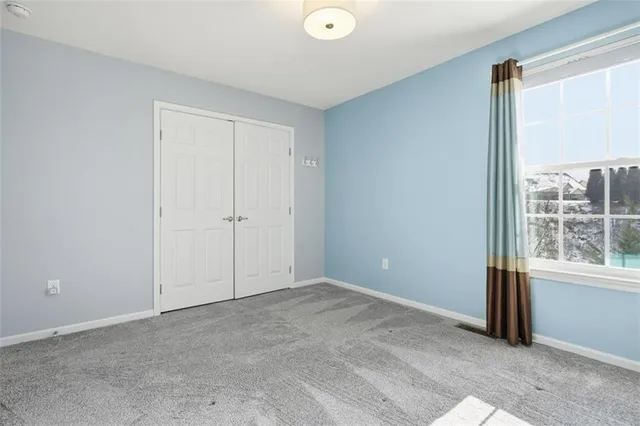 a view of a backyard with sitting area