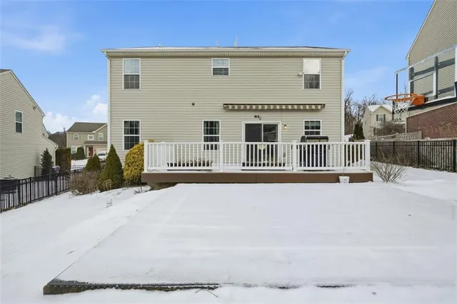 a view of a deck with wooden fence and floor