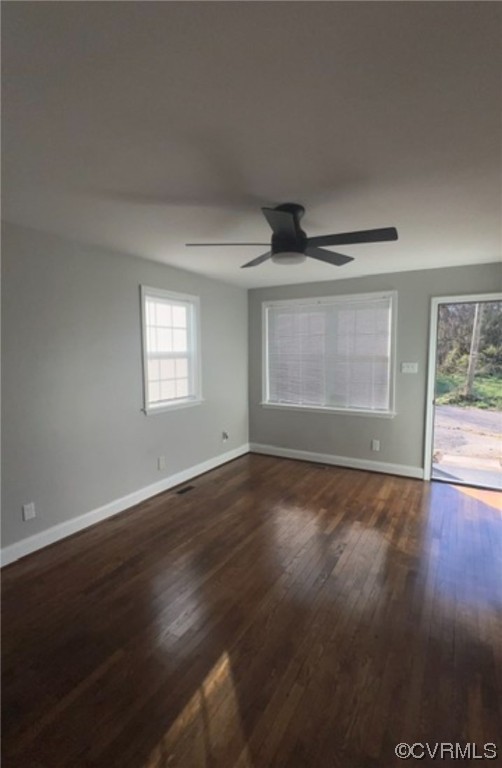 809 St James Street Petersburg, VA 23803 - Photo 3 of 9 a view of empty room with wooden floor and fan
