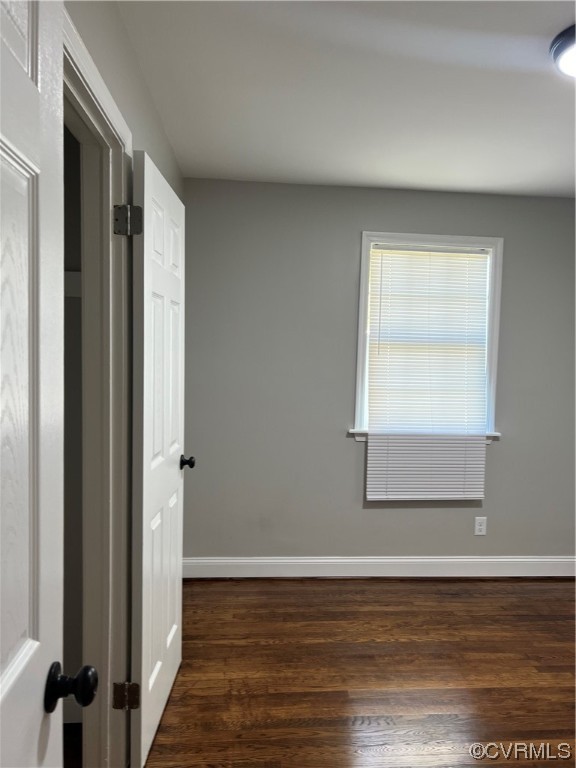 809 St James Street Petersburg, VA 23803 - Photo 6 of 9 a view of an empty room with wooden floor and a window