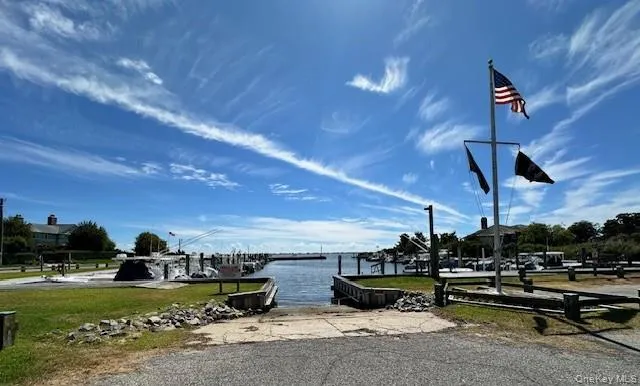 a view of a terrace with yard and outdoor seating