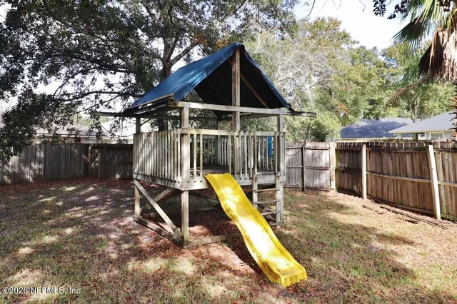 a view of a backyard with a small park