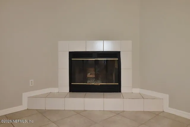 a living room with a fireplace