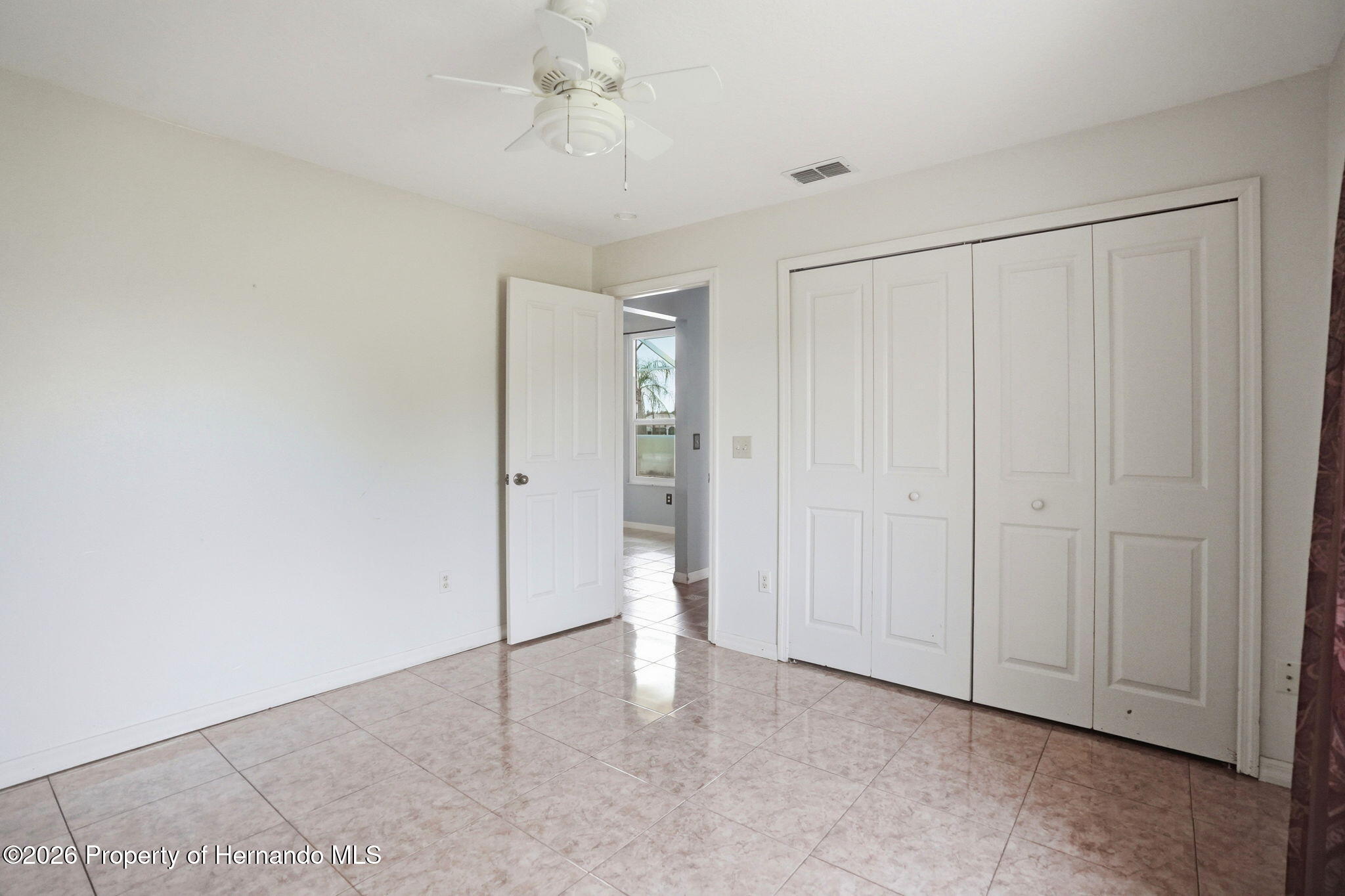 18131 Rivard Boulevard Brooksville, FL 34604 - Photo 34 of 66 a view of an empty room